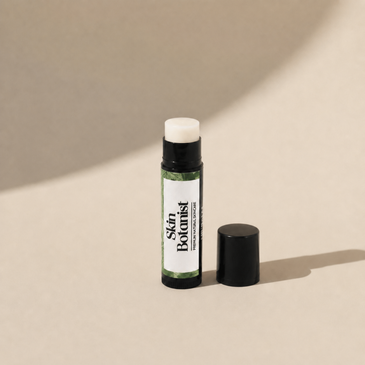 Skin Botanist Peppermint & Rose Geranium Lip Balm open lid texture view